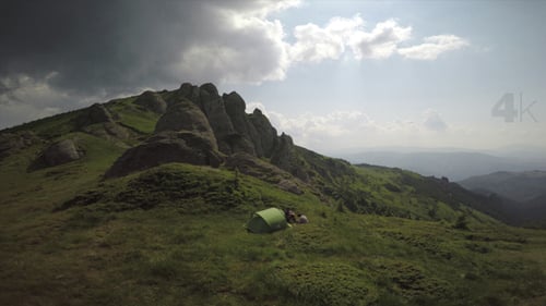Green Tent on Scenic Mountain Top