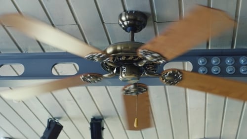Vintage Ceiling Fan Spinning Indoors