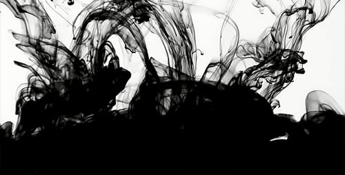 Abstract Black Ink Flowing Through Water