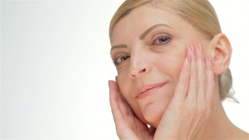 Adult Woman Demonstrates Skincare Techniques