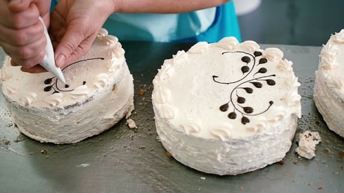 Cake Decoration with Chocolate Designs in Bakery