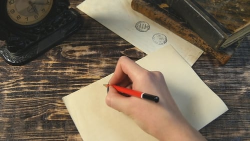 Writing a Letter on Parchment with a Pen