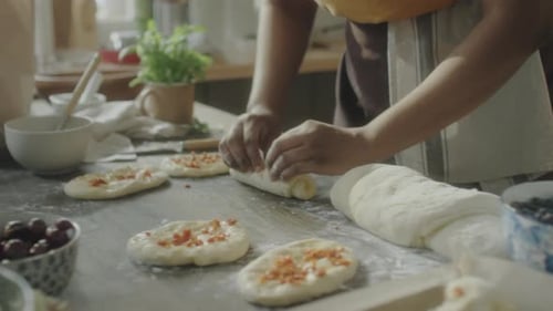 Making Delicious Homemade Pizza in Cozy Kitchen