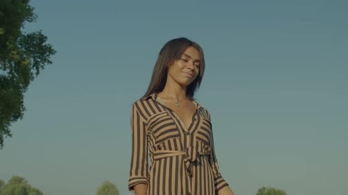 Attractive Woman Smiling in the Tropical Sun