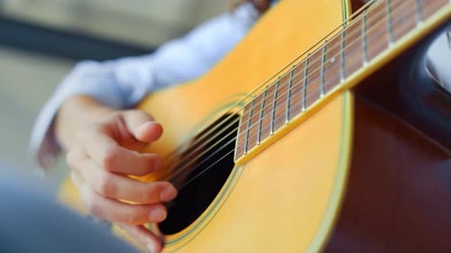 Close Up of Guitar Playing