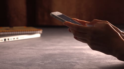 Woman Texting On Smartphone