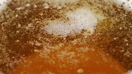 Foamy Beer with Bubbles Close Up