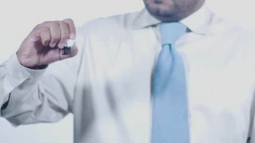 Adult Writes 'Immigration' on Clear Surface