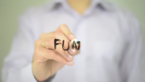Hand Writes Fun on Transparent Surface