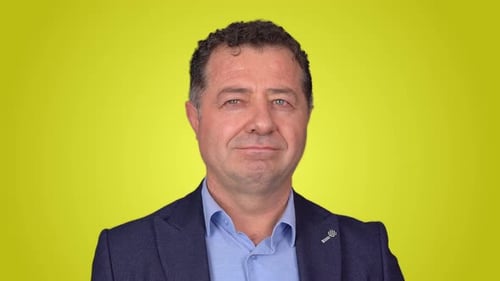 Man Portrait Against a Yellow Background