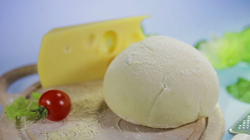 Pizza Ingredients including Cheese, Tomato and Dough