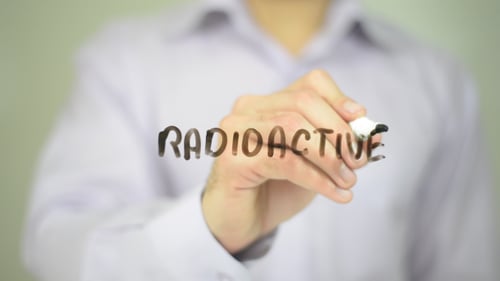 Writing Radioactive Word on Clear Glass Surface