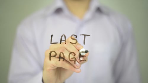 Hand Writing Last Page on Transparent Surface