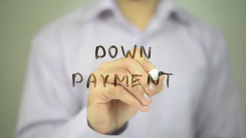 Man Writes Down Payment With Black Marker