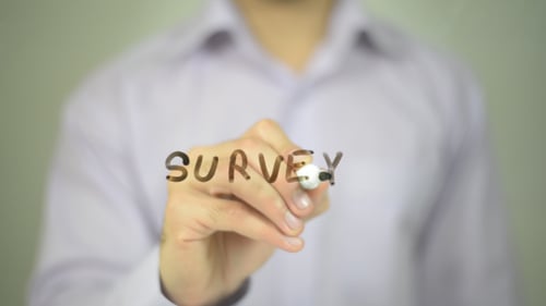 Man Writes Survey On Transparent Screen