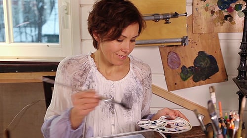 Woman Artist Drawing Picture In Studio