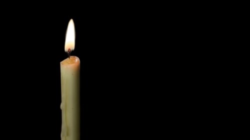 Burning Candle And Flame