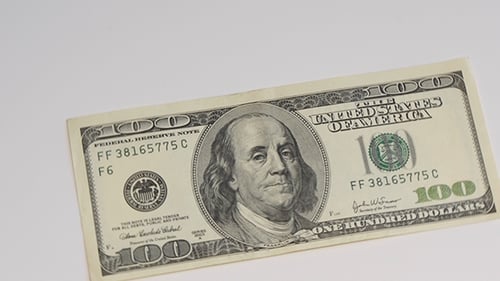 Close up of One Hundred Dollar Bill Rotating