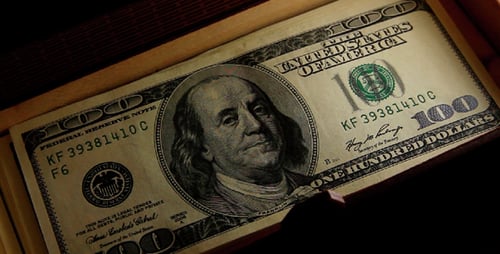 Opening a Wooden Box Full of Money