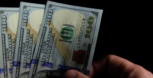 Counting Stack of One Hundred Dollar Bills