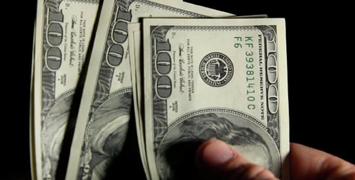 Counting Money, Piles of Hundred Dollar Bills