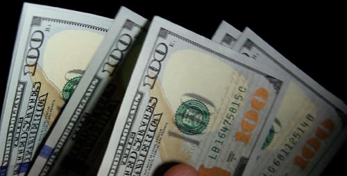 Counting Stack of One Hundred Dollar Bills