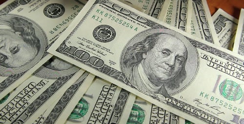 Hundred Dollar Bills Placed on Table