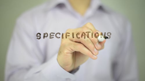 Hand Writes the Word Specifications with a Marker