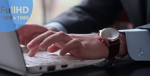 Man Working at a Laptop