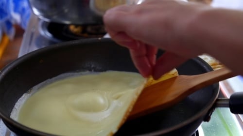 Cooking pancakes in a frying pan