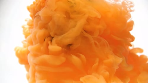 Abstract Orange and Black Ink Swirling