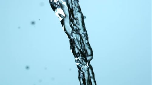 Water pouring and splashing in ultra slow motion 1500fps on a reflective surface - WATER POURS