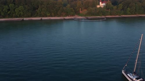 Ocean Waters and the Infinite Bridge By the Coast Against Forest Trees