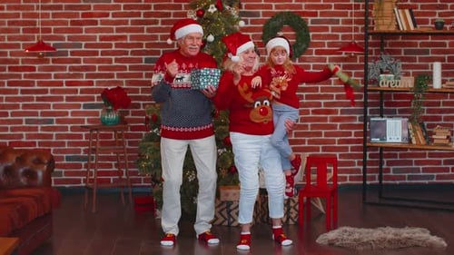 Happy Family Celebrates Christmas Together in Home