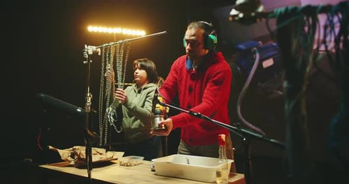 People Creating Sounds of Factory Workshop