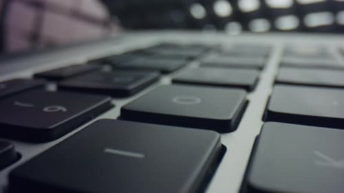 Close up of Black Keyboard with Camera Dolly