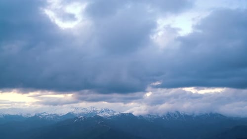 Scenic Mountains with Cloudscape and Golden Light