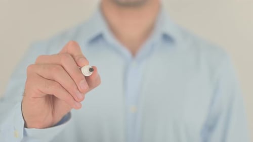 Man Writes "ACT FAST" on Clear Surface