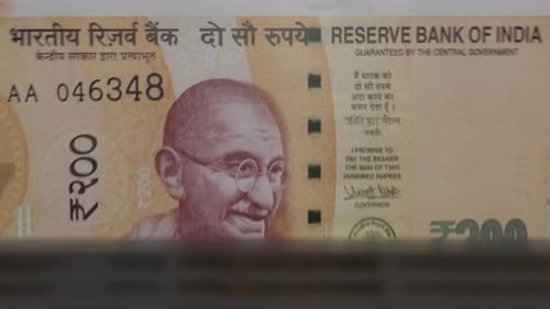 500 Indian rupees banknotes in cash machine.
