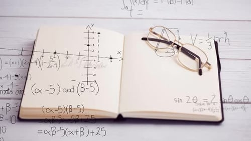 Mathematical equations against open book