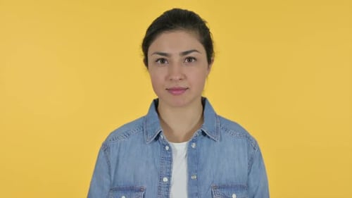 Woman Close Up on Yellow Background