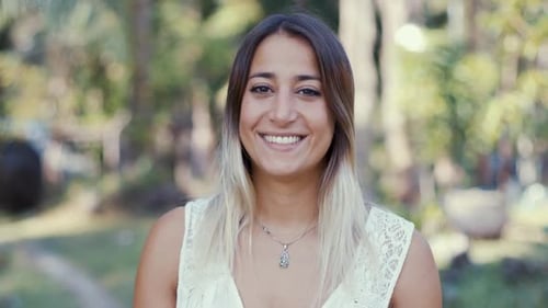 Woman Smiling Portrait in a Natural Setting