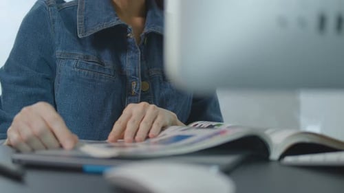 Creative Female Reading A Magazine