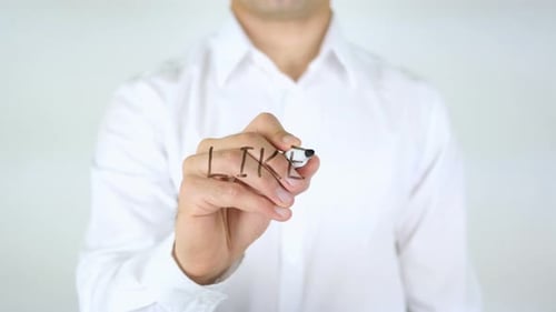 Man Writes 'LIKE' on Clear Surface with Marker