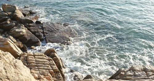 Sea wave and rock
