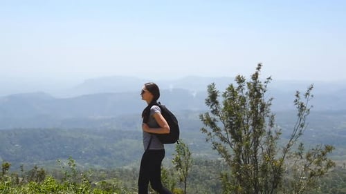 Young Female Hiker Backpack Walks Trail Mountains Canyon Background