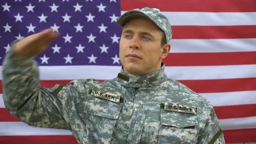 Soldier Saluting in Front of American Flag