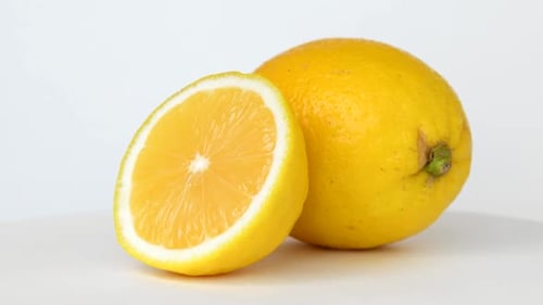 Bright Yellow Lemon and Lemon Slice Rotating