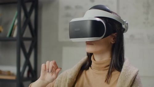Portrait Woman Architect Designer in Virtual Reality Helmet with Hands Imitates Work of Interface