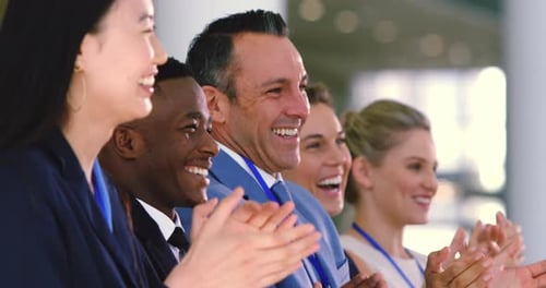 Diverse Business People Applauding at Conference